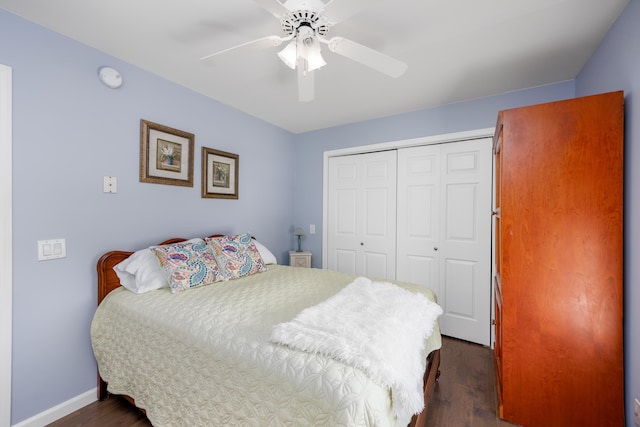 bedroom with ceiling fan, dark hardwood / wood-style flooring, and a closet