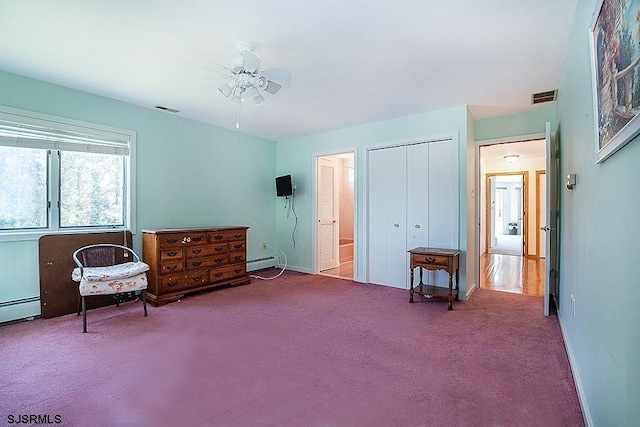 sitting room featuring carpet flooring, ceiling fan, and a baseboard heating unit