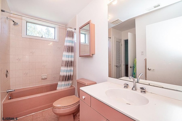 full bathroom featuring shower / bath combination with curtain, vanity, and toilet