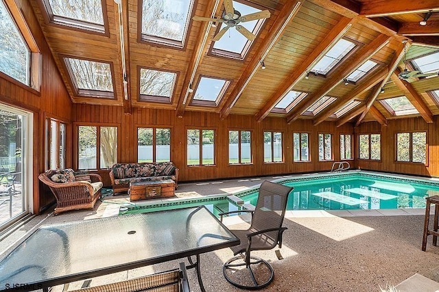 view of swimming pool featuring ceiling fan