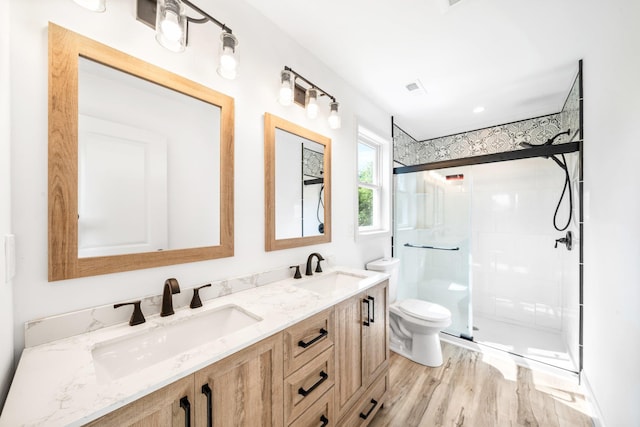 192 Rte 47 S, Cape May Court House, NJ 08210 - full bath featuring toilet, a stall shower, wood finished floors, and double vanity