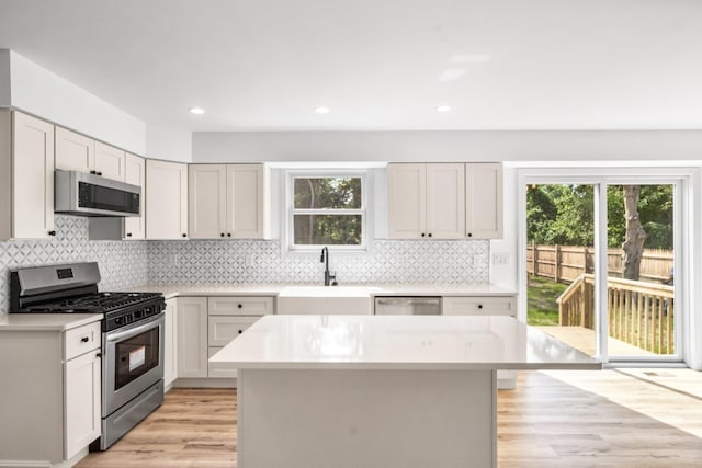 192 Rte 47 S, Cape May Court House, NJ 08210 - kitchen featuring stainless steel appliances, plenty of natural light, a sink, light wood finished floors, and recessed lighting