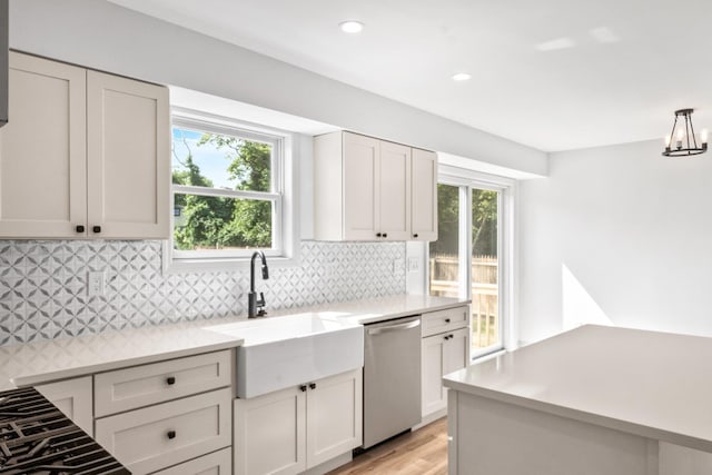 192 Rte 47 S, Cape May Court House, NJ 08210 - kitchen with dishwasher, a sink, light countertops, tasteful backsplash, and recessed lighting