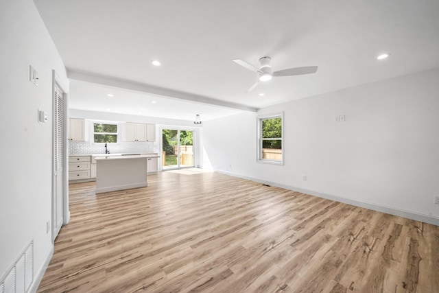 192 Rte 47 S, Cape May Court House, NJ 08210 - unfurnished living room with a ceiling fan, light wood-style floors, plenty of natural light, recessed lighting, and a sink