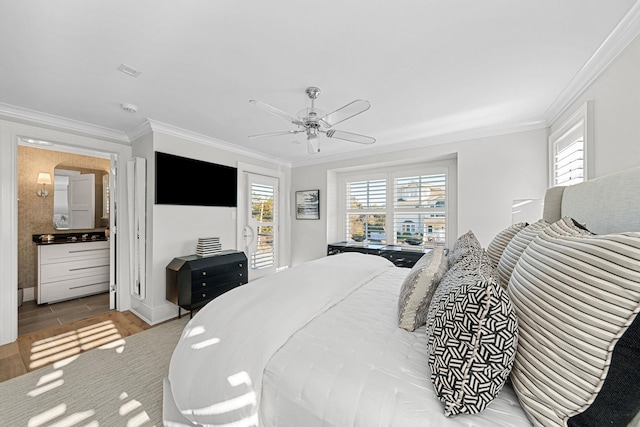 bedroom with ceiling fan and ornamental molding