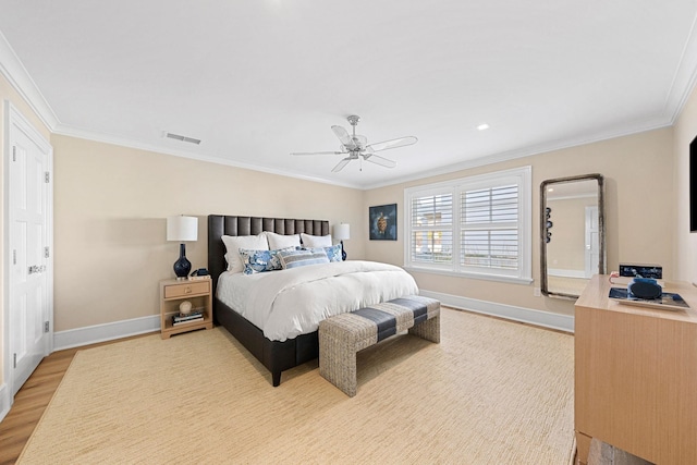 bedroom featuring ceiling fan, crown molding, and hardwood / wood-style flooring