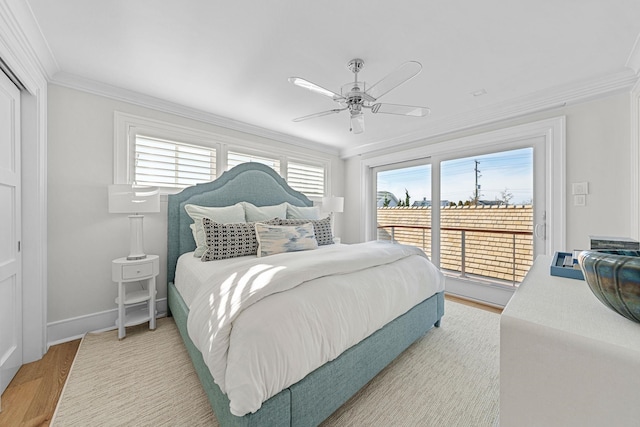 bedroom with access to exterior, wood-type flooring, ceiling fan, and ornamental molding