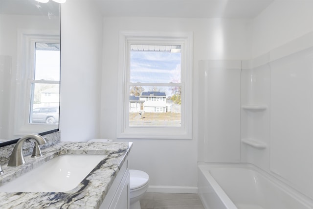 full bathroom featuring vanity, toilet, and shower / tub combination