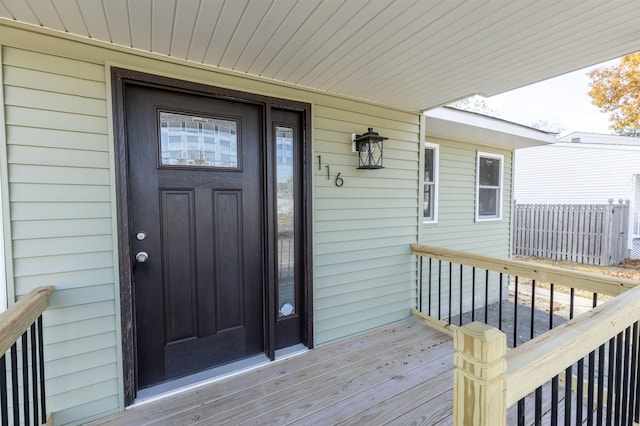 doorway to property with covered porch