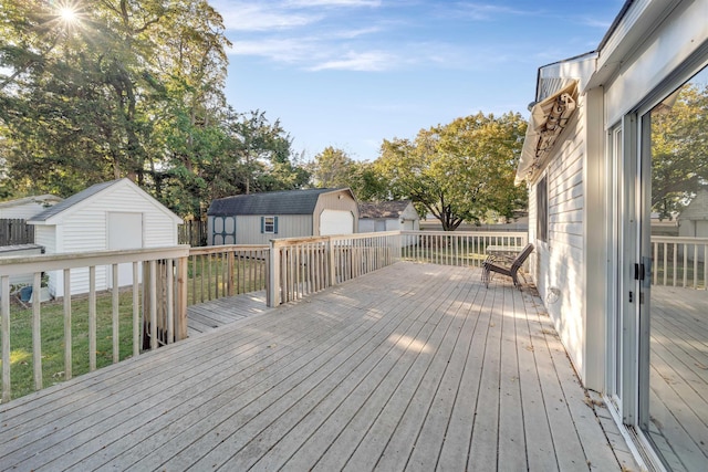 wooden deck featuring a storage shed