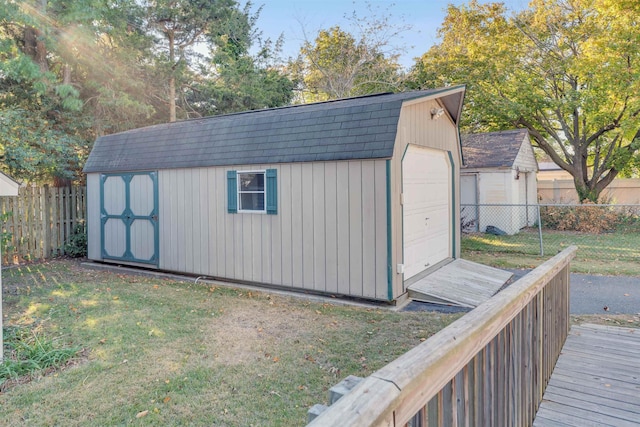 view of outdoor structure with a lawn