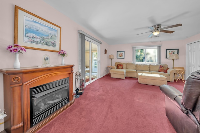 living room with carpet floors and ceiling fan