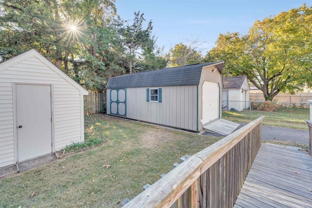 view of outbuilding featuring a lawn