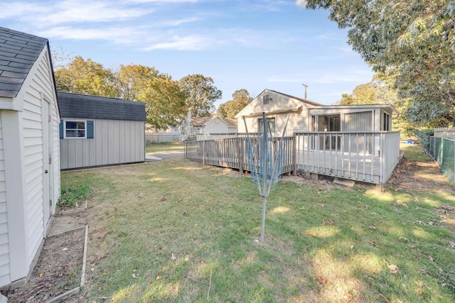 view of yard with a deck