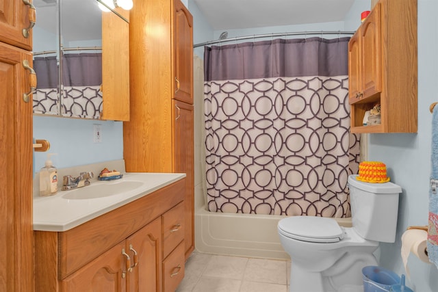 full bathroom with tile patterned floors, vanity, toilet, and shower / bath combo