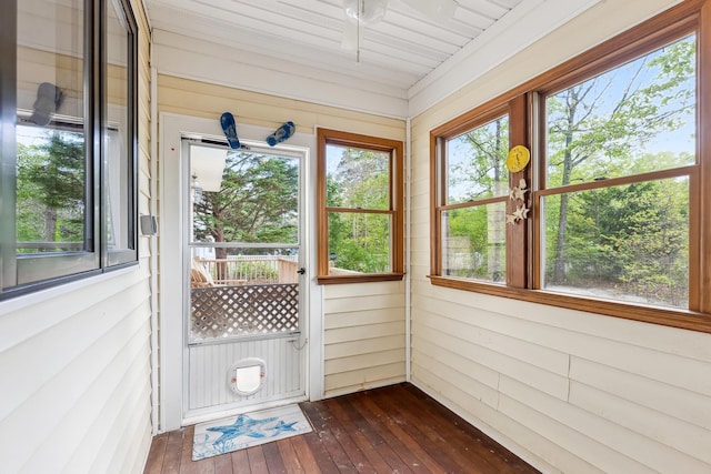 57 Somers Ave, Seaville, NJ 08230 - unfurnished sunroom with hardwood / wood-style flooring, healthy amount of natural light, and wood walls