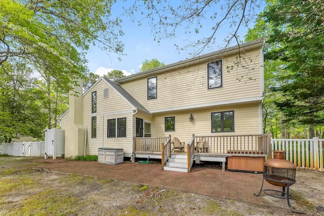 57 Somers Ave, Seaville, NJ 08230 - back of house with an outdoor fire pit, a patio, a wooden deck, fence, and a gate