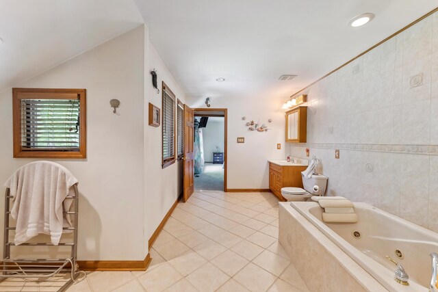 57 Somers Ave, Seaville, NJ 08230 - bathroom featuring a jetted tub, tile patterned floors, vanity, and baseboards