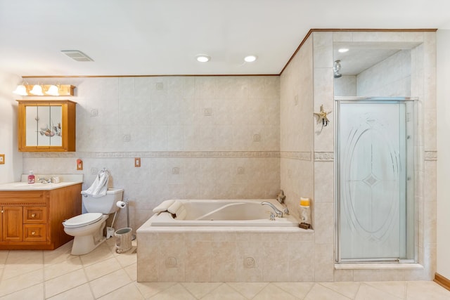 57 Somers Ave, Seaville, NJ 08230 - bathroom with tile patterned flooring, a shower stall, vanity, tile walls, and a bath
