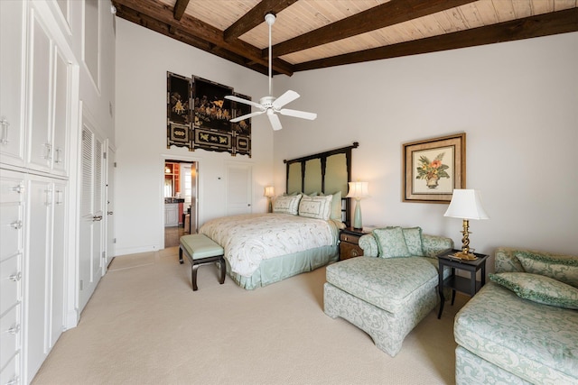 bedroom with ceiling fan, wooden ceiling, beamed ceiling, high vaulted ceiling, and light colored carpet