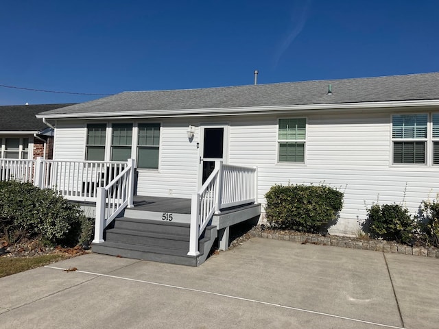 view of front of house with a deck