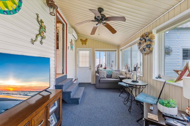 sunroom featuring vaulted ceiling, a wall mounted AC, wooden walls, and carpet flooring