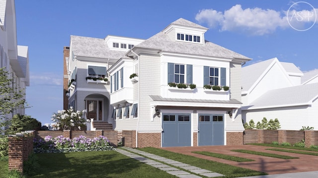 4640 Ocean Dr, Avalon, NJ 08202 - view of front facade with driveway, an attached garage, and brick siding