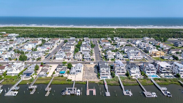 4640 Ocean Dr, Avalon, NJ 08202 - aerial view of property and surrounding area with a large body of water and nearby suburban area