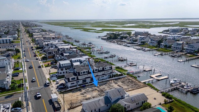 4640 Ocean Dr, Avalon, NJ 08202 - aerial perspective of suburban area featuring a large body of water