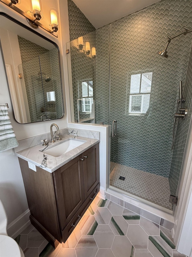 207 120th St, Stone Harbor, NJ 08247 - bathroom featuring vanity, a shower stall, and tile patterned flooring