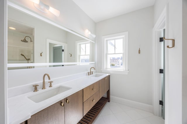 207 120th St, Stone Harbor, NJ 08247 - bathroom with double vanity, a shower, and tile patterned flooring