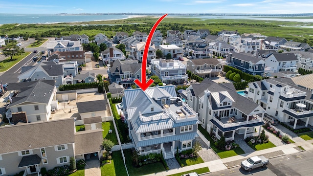 207 120th St, Stone Harbor, NJ 08247 - aerial perspective of suburban area with a large body of water