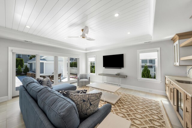 207 120th St, Stone Harbor, NJ 08247 - living room with wood ceiling, a ceiling fan, a tray ceiling, and recessed lighting