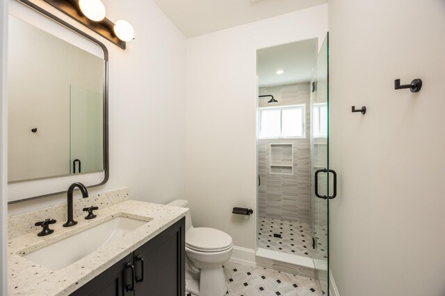 207 120th St, Stone Harbor, NJ 08247 - bathroom featuring vanity, a shower stall, and tile patterned floors