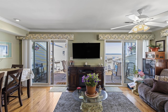 127 W Spruce Ave Unit B, North Wildwood, NJ 08260 - living area featuring light wood-style flooring, ornamental molding, and ceiling fan