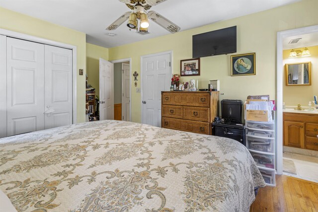 127 W Spruce Ave Unit B, North Wildwood, NJ 08260 - bedroom with hardwood / wood-style floors, a closet, connected bathroom, and a ceiling fan