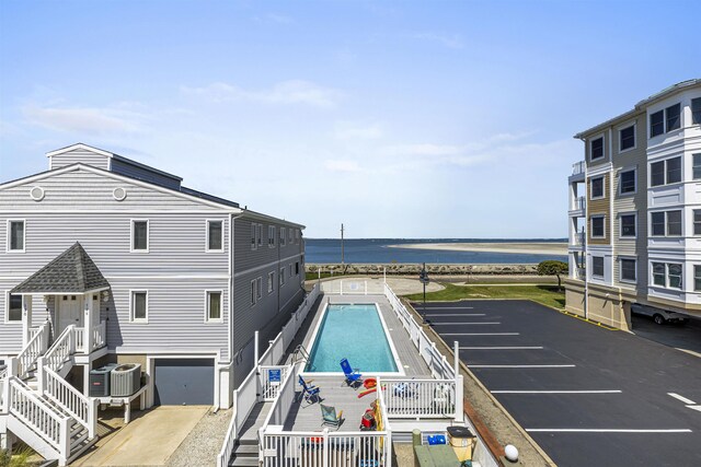 127 W Spruce Ave Unit B, North Wildwood, NJ 08260 - view of pool with a water view and cooling unit