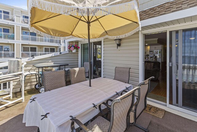 127 W Spruce Ave Unit B, North Wildwood, NJ 08260 - wooden deck featuring outdoor dining space