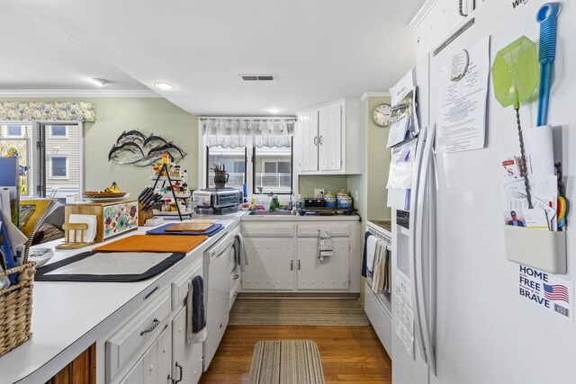 127 W Spruce Ave Unit B, North Wildwood, NJ 08260 - kitchen with white appliances, white cabinets, dark wood finished floors, crown molding, and recessed lighting