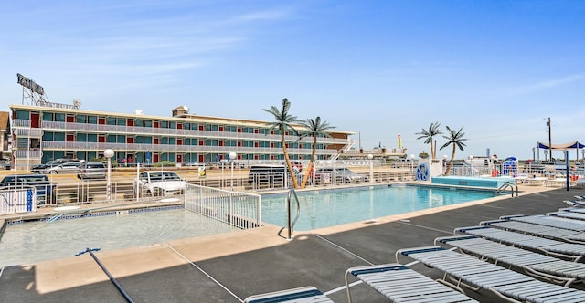 view of swimming pool featuring a patio