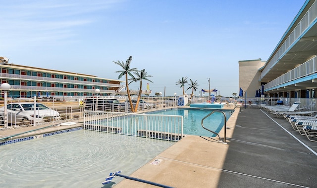 view of pool featuring a patio area