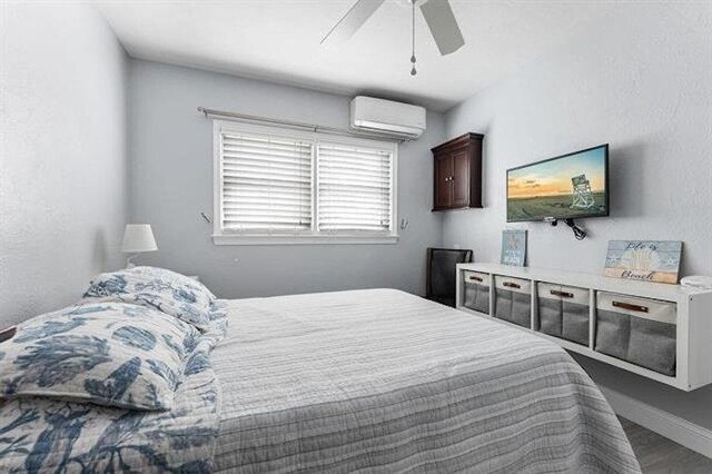 301 E Lavender Rd Unit 2, Wildwood, NJ 08260 - bedroom featuring a wall mounted AC and a ceiling fan