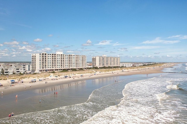 property view of water featuring a beach view