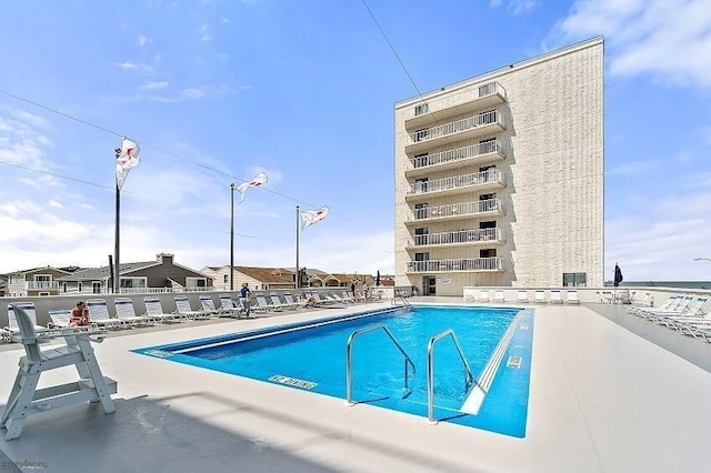 view of pool with a patio area