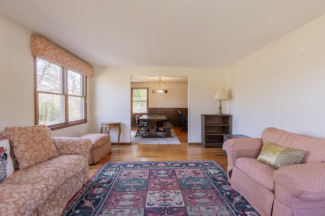 living area with wood finished floors