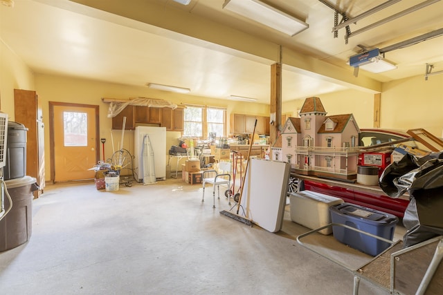 garage with freestanding refrigerator