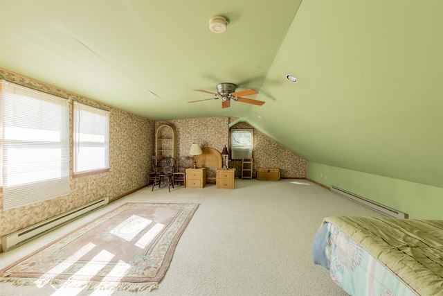 unfurnished bedroom featuring a baseboard heating unit, carpet flooring, wallpapered walls, baseboard heating, and vaulted ceiling