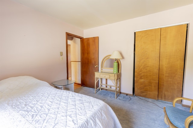 bedroom featuring baseboards and carpet flooring