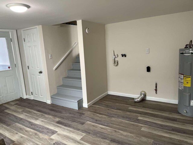 712 Indian Ave, North Cape May, NJ 08204 - foyer entrance with water heater, wood finished floors, and stairs