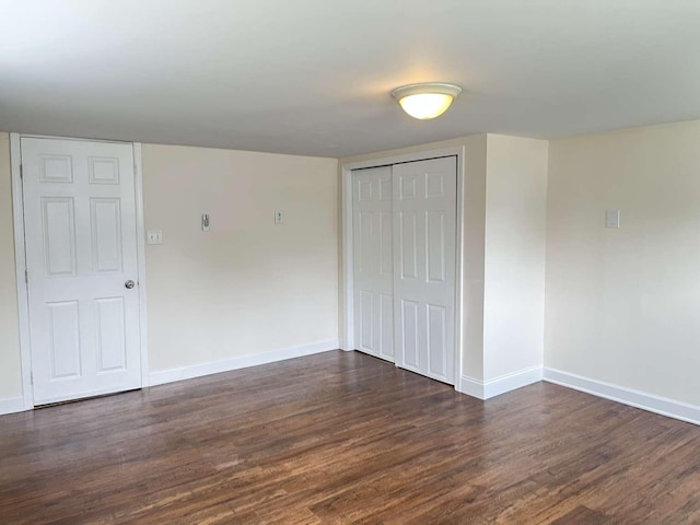 712 Indian Ave, North Cape May, NJ 08204 - unfurnished bedroom with dark wood finished floors and a closet